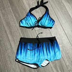 Woman’s two piece swim suit.  Size Large. Blue